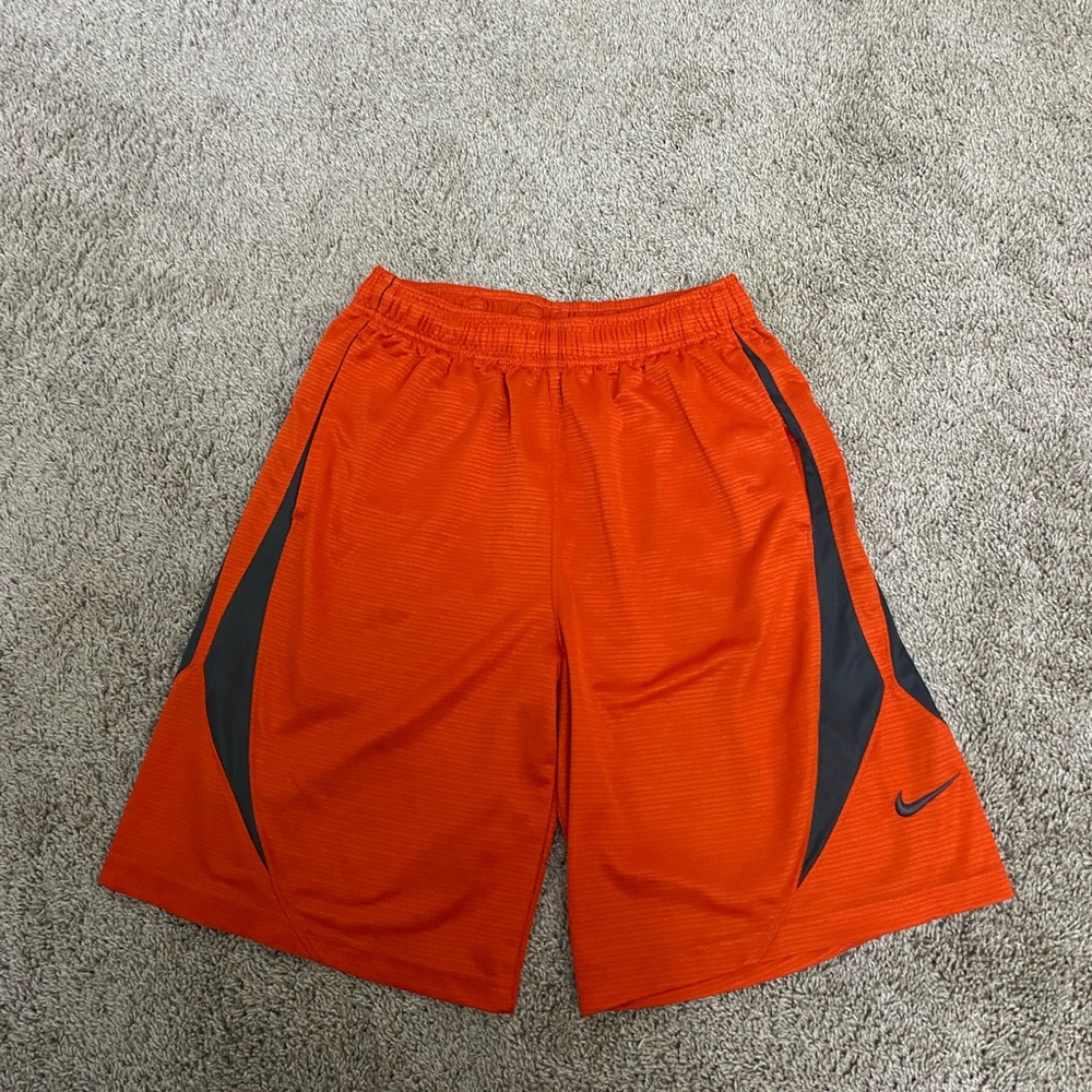 Orange and gray Nike shorts